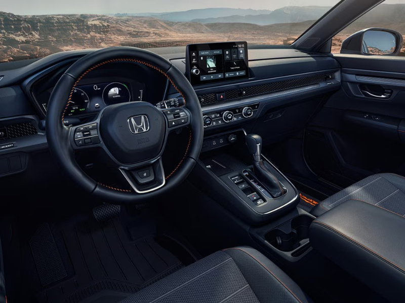 Interior of the Honda CR-V Hybrid showing the touchscreen and cabin
