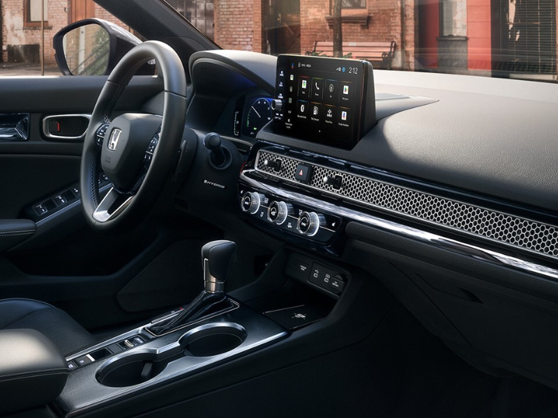 Interior of the Honda Civic sedan showing the dashboard and touchscreen